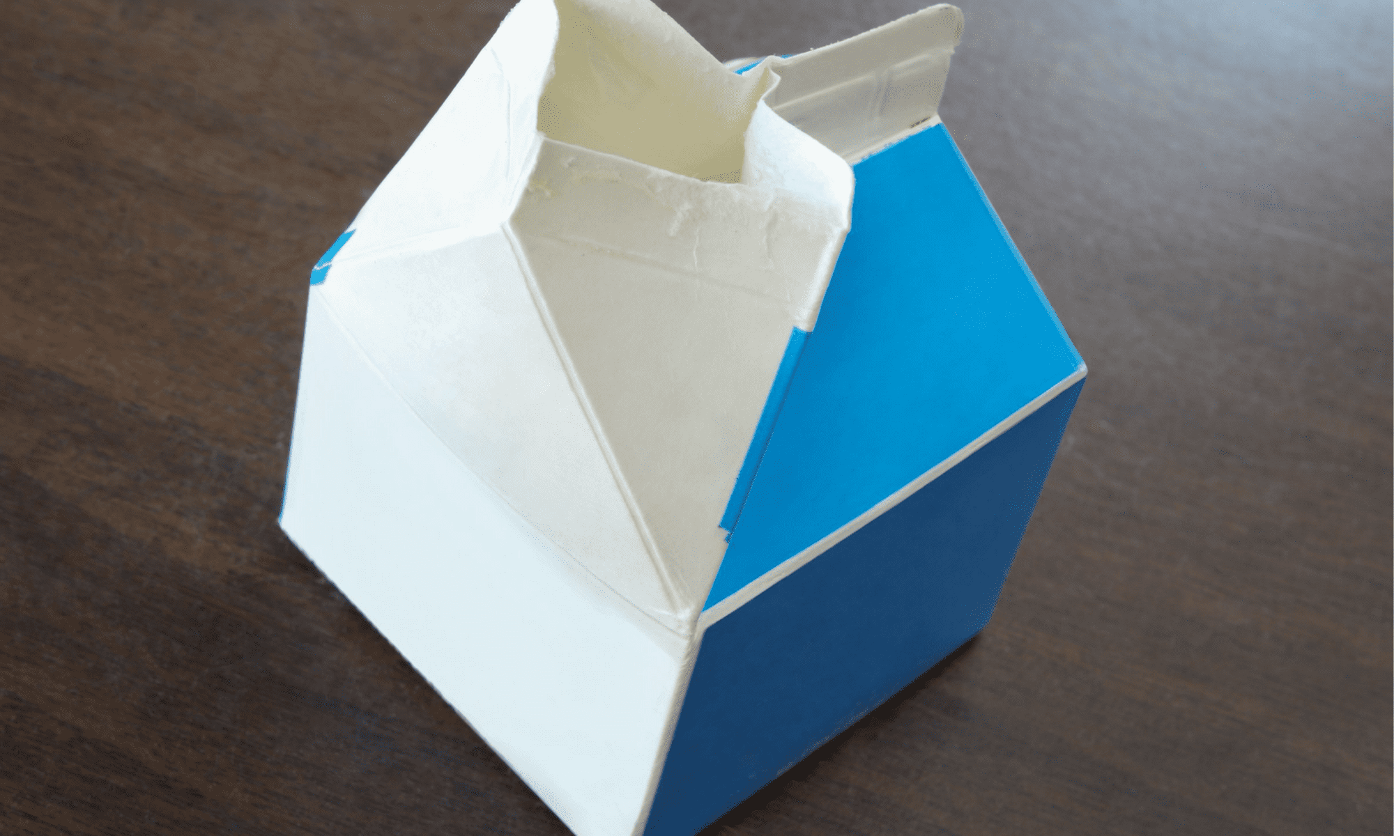 Picture of blue and white half-pint milk carton